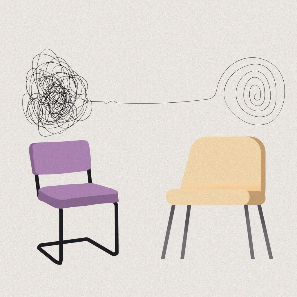 Deux fauteuils face à face et un fil emmêlé qui se démêle